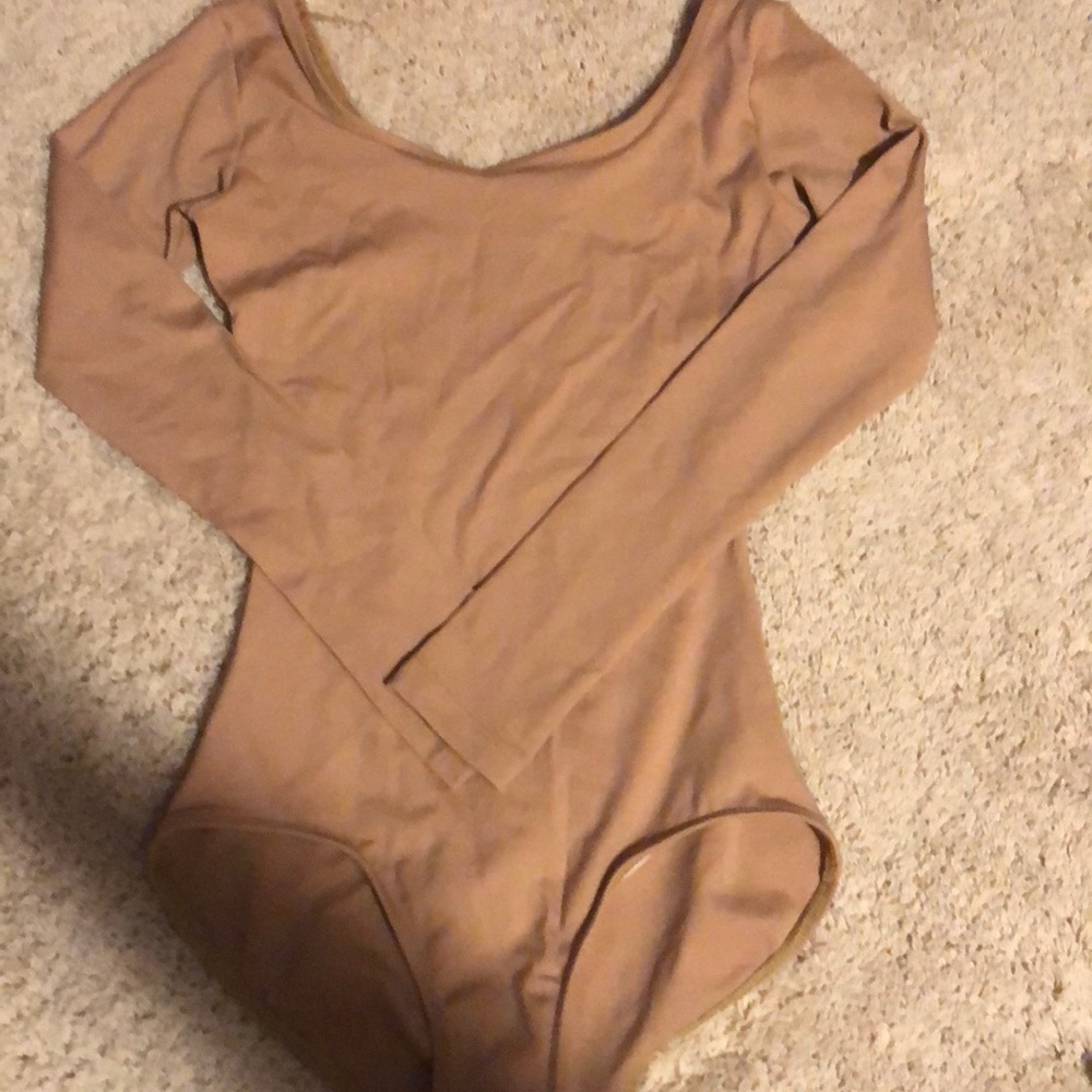 tan leotard, long sleeves